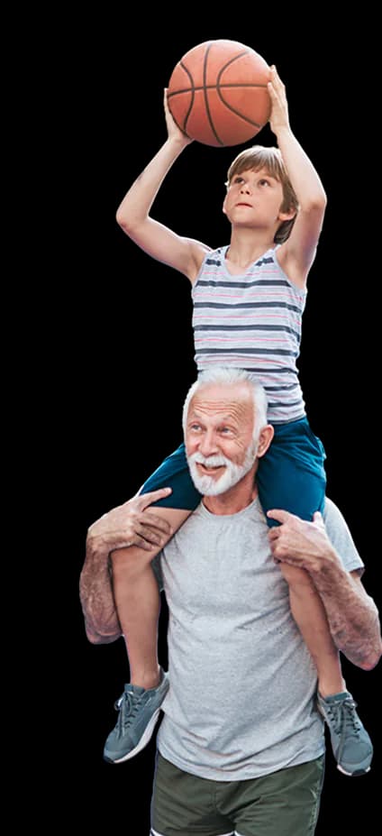 Father carrying child on shoulders